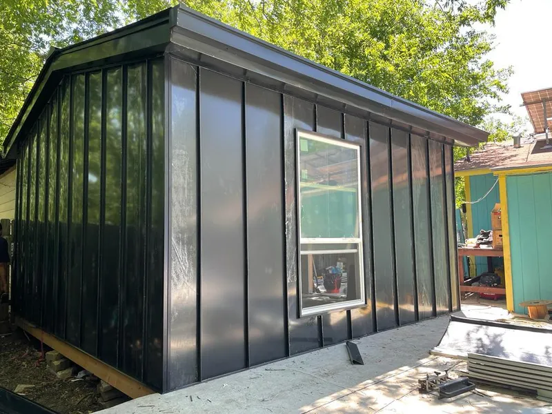 Black standing seam metal wall panels for Metal Roof Installation in Hobbs