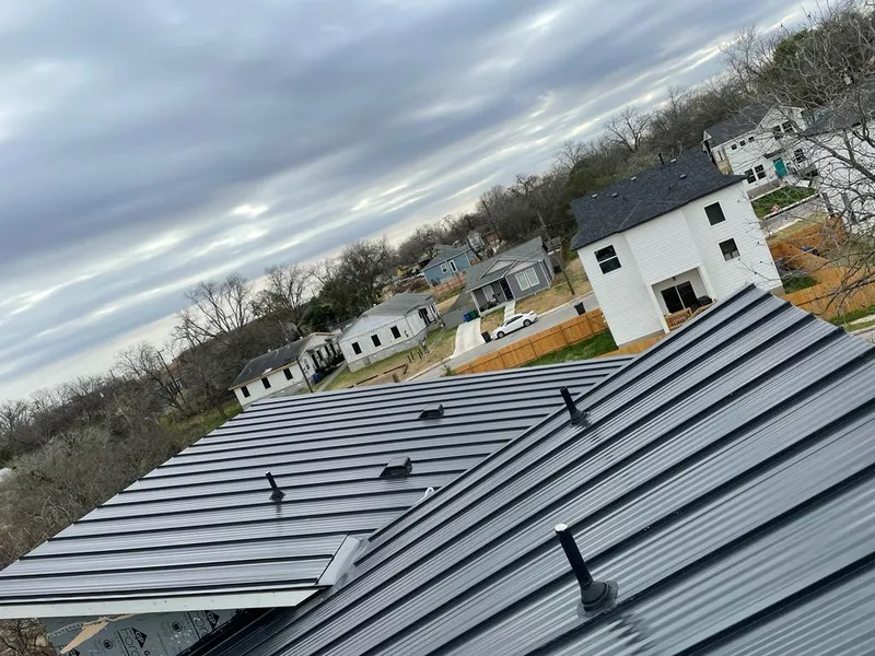 Standing seam metal roof panels with vents for Skylight Repair in Hobbs